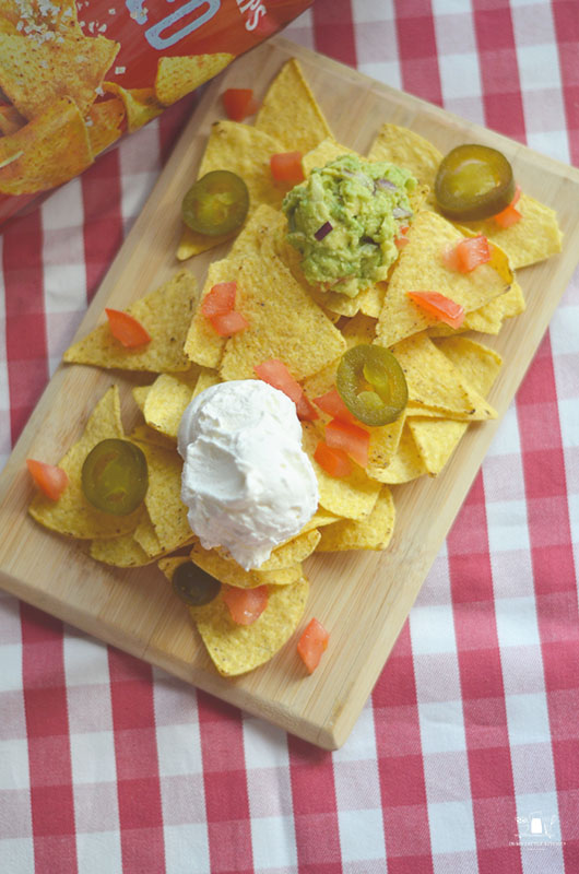 Tabla de nachos con crema agria