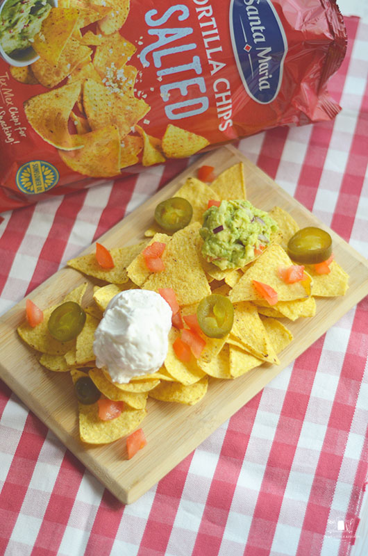 Tabla de nachos con crema agria